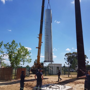 Floodlight mast section being lifted